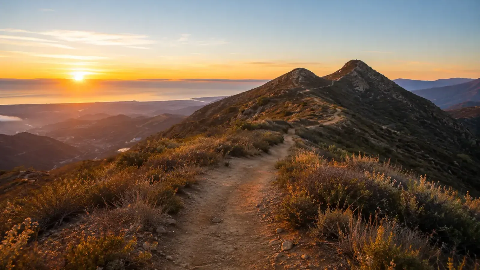 Dawn over the ridgeline and trail near San Marcos, California